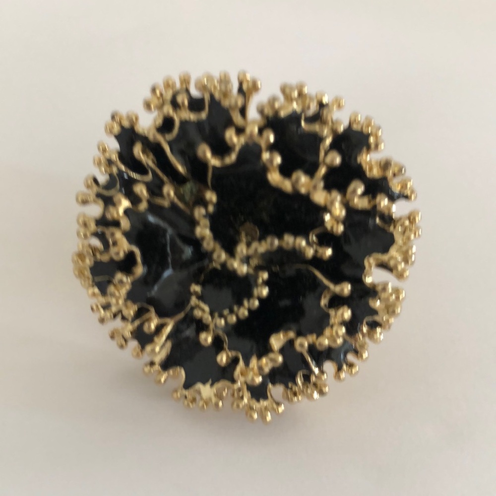 - Women stretching cocktail ring adjustable